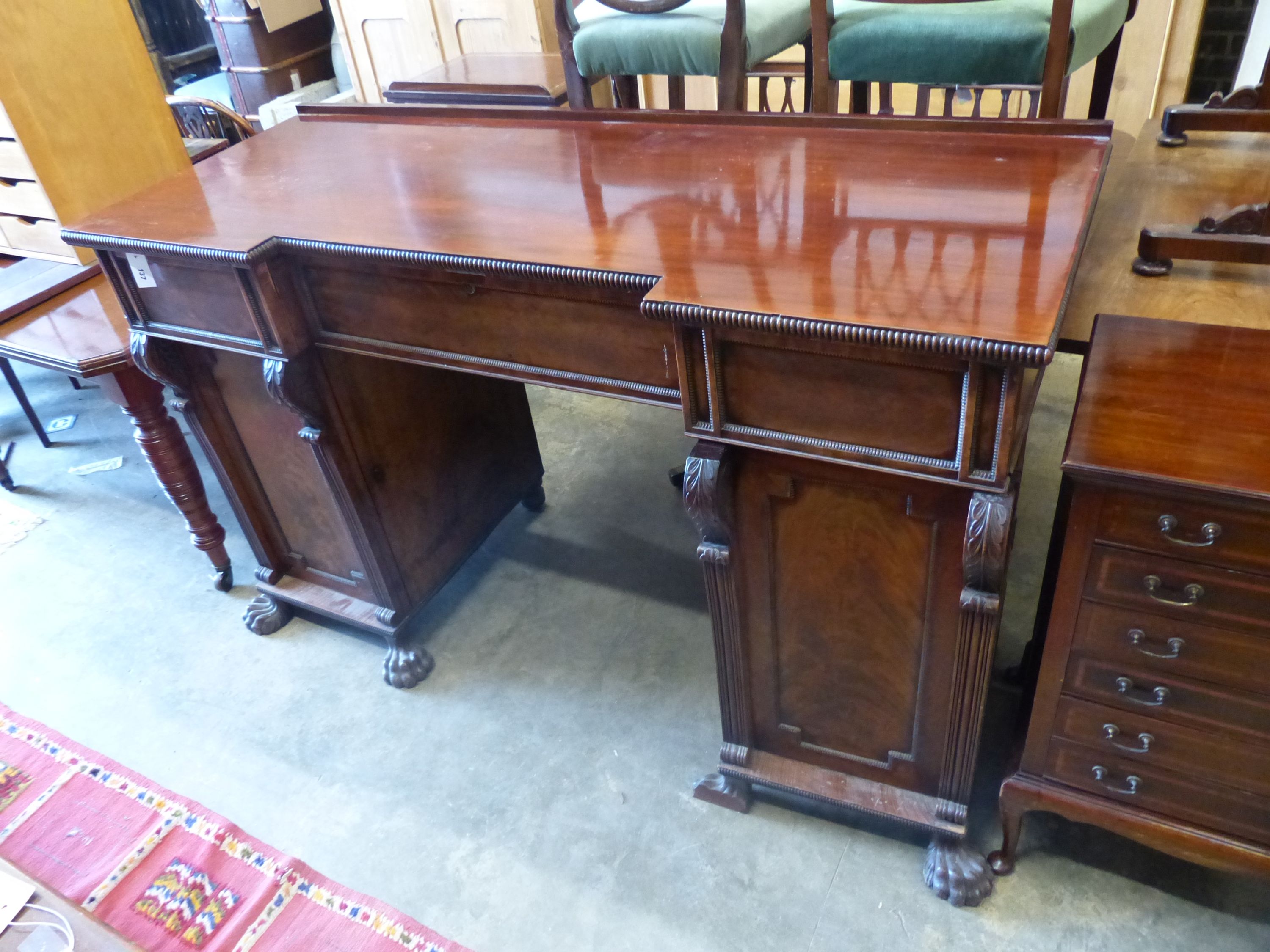 A Victorian mahogany inverse breakfront pedestal sideboard, length 165cm, depth 66cm, height 102cm